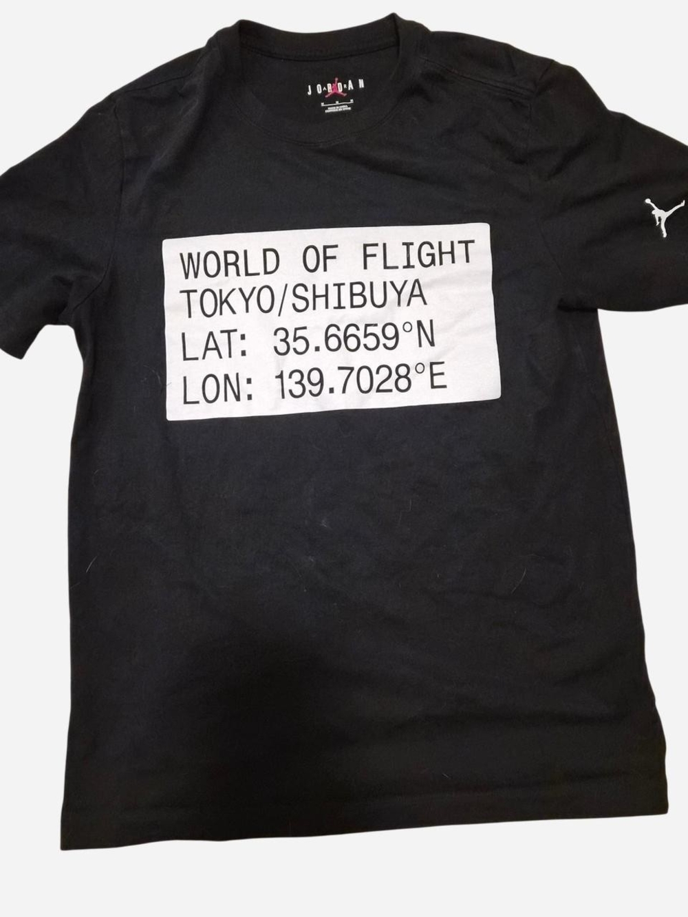 Jordan Black Short Sleeve Tee with White 'World of Flight' Graphic